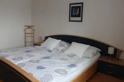 Ein Bett oder Betten in einem Zimmer der Unterkunft Ferienwohnung by Josef Lanzinger