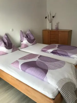 Ein Bett oder Betten in einem Zimmer der Unterkunft Ferienwohnung by Josef Lanzinger