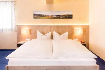 Ein Bett oder Betten in einem Zimmer der Unterkunft Pension Anna