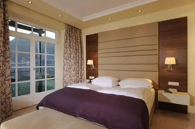 Ein Bett oder Betten in einem Zimmer der Unterkunft Hotel & Gasthof Fürberg