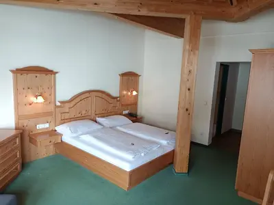 Ein Bett oder Betten in einem Zimmer der Unterkunft Hotel Grünwaldkopf