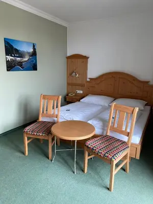 Ein Bett oder Betten in einem Zimmer der Unterkunft Hotel Grünwaldkopf
