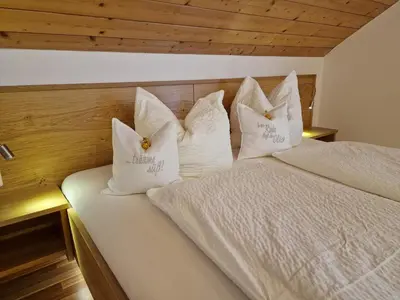 Ein Bett oder Betten in einem Zimmer der Unterkunft Bio-Bauernhof Vordergrubenbach - Familie Oberascher