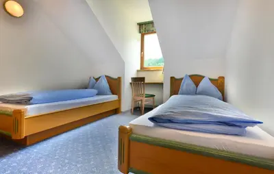 Ein Bett oder Betten in einem Zimmer der Unterkunft Landgasthof Jagawirt