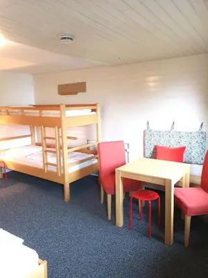 Ein Bett oder Betten in einem Zimmer der Unterkunft Ferienhaus Kurzenhof Radstadt