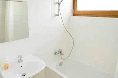Ein Badezimmer in der Unterkunft FeWo-Gmunden - Traunsee Apartment 60 m2