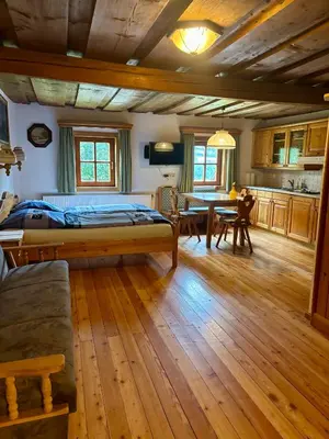 Ein Bett oder Betten in einem Zimmer der Unterkunft Moarhof