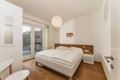 Ein Bett oder Betten in einem Zimmer der Unterkunft Appartement Gabbie by Schladming-Appartements