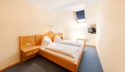 Ein Bett oder Betten in einem Zimmer der Unterkunft Haus Wolfgangsee