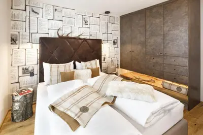 Ein Bett oder Betten in einem Zimmer der Unterkunft Katschberg Lodge