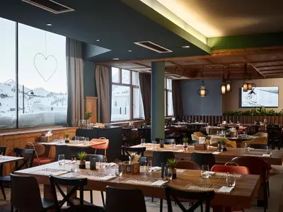 Ein Restaurant oder anderes Speiselokal in der Unterkunft PLACES Obertauern by Valamar