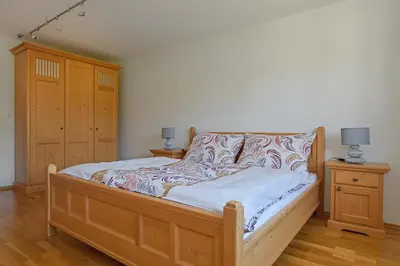 Ein Bett oder Betten in einem Zimmer der Unterkunft Ferienwohnung Hentschel
