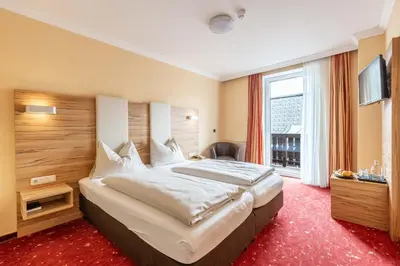 Ein Bett oder Betten in einem Zimmer der Unterkunft Hotel Post by keyone