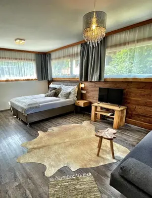 Ein Bett oder Betten in einem Zimmer der Unterkunft Chalet Maya
