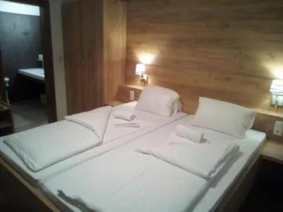 Ein Bett oder Betten in einem Zimmer der Unterkunft Torrenerhof