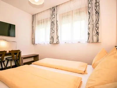 Ein Bett oder Betten in einem Zimmer der Unterkunft Apartment Hochjoch by Interhome