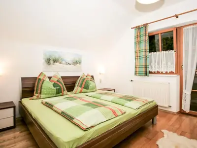 Ein Bett oder Betten in einem Zimmer der Unterkunft Apartment Poldi by Interhome