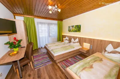 Ein Bett oder Betten in einem Zimmer der Unterkunft Pension Montana