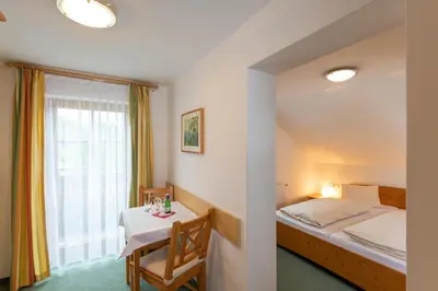 Ein Bett oder Betten in einem Zimmer der Unterkunft Ferienhof Nasnergut