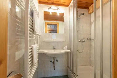 Ein Badezimmer in der Unterkunft Ferienhof Nasnergut