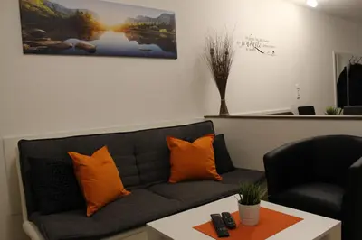 Ein Sitzbereich in der Unterkunft Familienapartment Sunnseitn