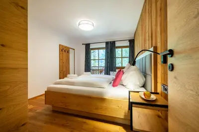 Ein Bett oder Betten in einem Zimmer der Unterkunft Der Lammhof - Appartements Kaswurm