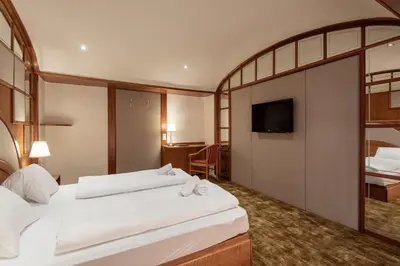 Ein Bett oder Betten in einem Zimmer der Unterkunft Die feine Herberge