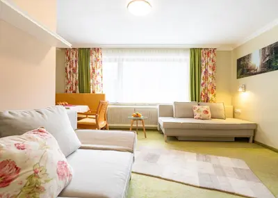 Ein Sitzbereich in der Unterkunft Chalet Ferienhaus Hubertus