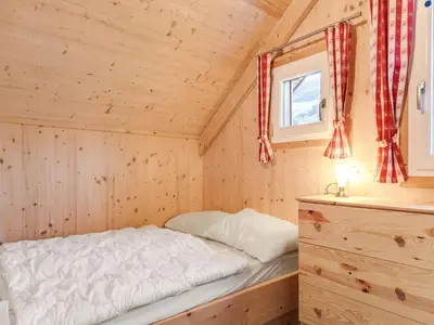 Ein Bett oder Betten in einem Zimmer der Unterkunft Chalet in Murau nahe Kreischberg