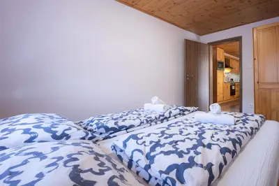 Ein Bett oder Betten in einem Zimmer der Unterkunft Apartmenthaus Esther