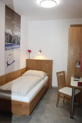 Ein Bett oder Betten in einem Zimmer der Unterkunft Der Sailer Hotel & Restaurant