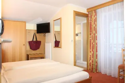 Ein Bett oder Betten in einem Zimmer der Unterkunft Der Sailer Hotel & Restaurant