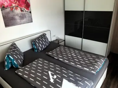 Ein Bett oder Betten in einem Zimmer der Unterkunft Sonnseite