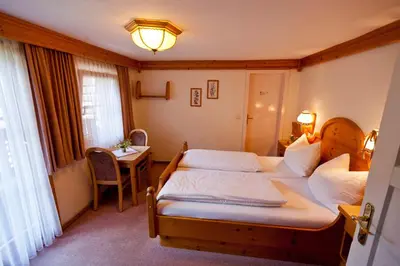 Ein Bett oder Betten in einem Zimmer der Unterkunft Bio-Bauernhof Grundlehnerhof