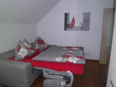 Ein Bett oder Betten in einem Zimmer der Unterkunft Appartment Stroblhof