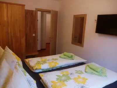 Ein Bett oder Betten in einem Zimmer der Unterkunft Appartment Stroblhof