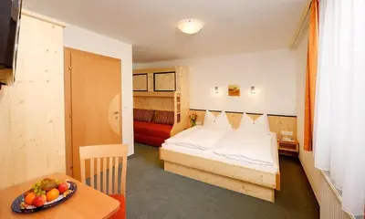 Ein Bett oder Betten in einem Zimmer der Unterkunft Werfenerhof