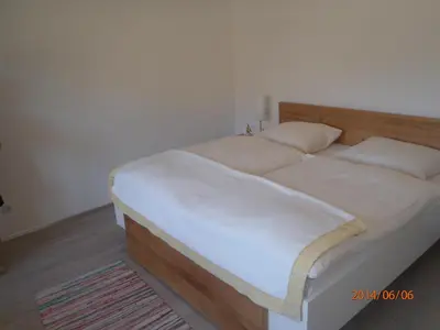Ein Bett oder Betten in einem Zimmer der Unterkunft Gästehaus Rosa Leitgeb