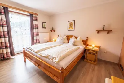 Ein Bett oder Betten in einem Zimmer der Unterkunft Haus Martina