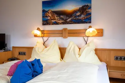 Ein Bett oder Betten in einem Zimmer der Unterkunft Unerzhuberhof