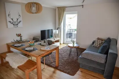 Ein Sitzbereich in der Unterkunft Alpine Appartement Top 8 by AA Holiday Homes
