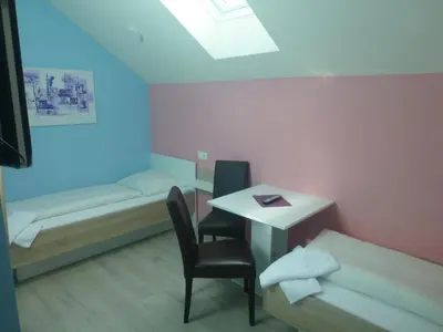 Ein Bett oder Betten in einem Zimmer der Unterkunft smartMotel