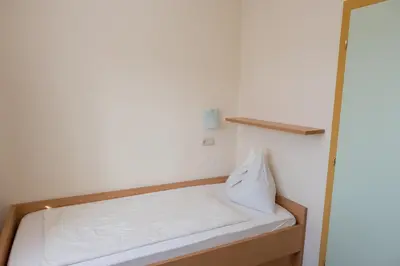 Ein Bett oder Betten in einem Zimmer der Unterkunft smartMotel