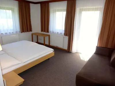 Ein Bett oder Betten in einem Zimmer der Unterkunft Chalet Das Atrium