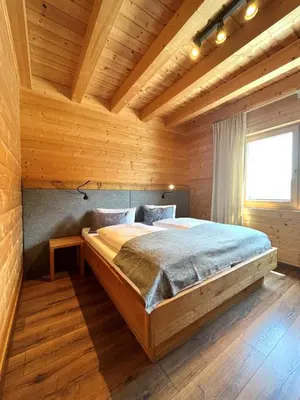 Ein Bett oder Betten in einem Zimmer der Unterkunft Bergchalet Raffalt