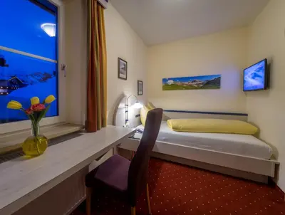 Ein Bett oder Betten in einem Zimmer der Unterkunft Pension Weinberger