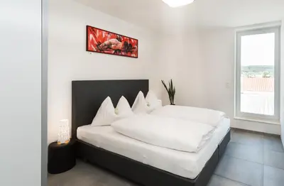 Ein Bett oder Betten in einem Zimmer der Unterkunft Hotel Restaurant Sailer
