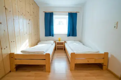 Ein Bett oder Betten in einem Zimmer der Unterkunft Haus Petergstamm