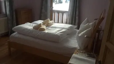 Ein Bett oder Betten in einem Zimmer der Unterkunft Ferienhaus König