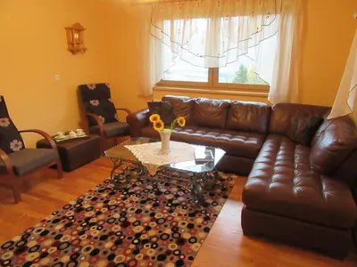 Ein Sitzbereich in der Unterkunft Ferienhaus König